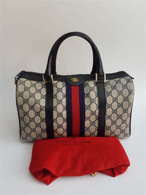 gucci navy monogram purse|gucci handbag ophidia.